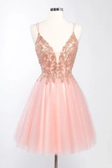 Embroidered short sleeveless dress paired with A-line skirt