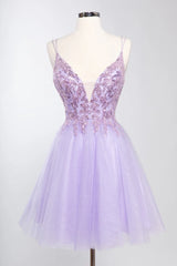 Embroidered short sleeveless dress paired with A-line skirt