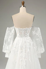 White A-line chiffon long sleeved wedding dress with applique lace