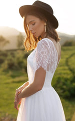 Bohemian A Line Lace Tulle Jewel Short Sleeve Wedding Dress with Ruffles