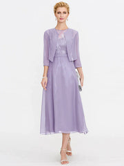 A-Line Mother of the Bride Dress Plus Size Elegant Illusion Neck Tea Length Chiffon Corded Lace Sleeveless Wrap Included with Lace Pleats