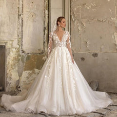Elegant Deep V-neck Wedding Dress with Appliques, Lace, Ruffles, and Tulle