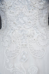 Elegant Long Sleeve Ball Gown Wedding Dress with Lace Appliques