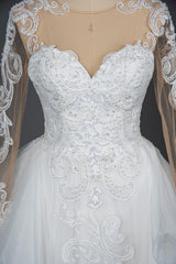 Elegant Long Sleeve Ball Gown Wedding Dress with Lace Appliques