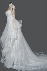 Elegant Long Sleeve Ball Gown Wedding Dress with Lace Appliques