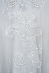 Elegant Long Sleeve Ball Gown Wedding Dress with Lace Appliques