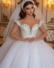 Glamorous Off-the-Shoulder Beaded Princess Wedding Dress with Pearl Tulle