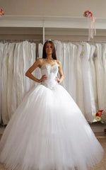 Sweetheart Sleeveless Tulle Ball Gown Wedding Dress with Corset Bodice and Rhinestones